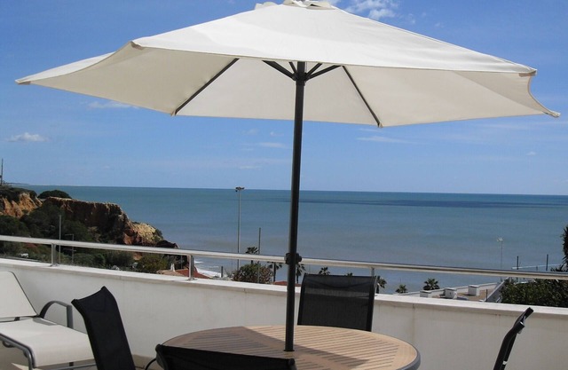 Apartment in Olhos de Água with Breathtaking Views Of The Private Pool & Beach