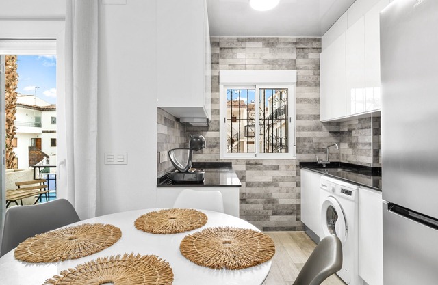 Apartment 'Punta Prima Palm Beach' with Shared Pool, Balcony and Wi-Fi