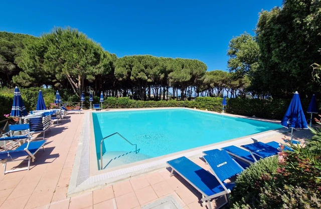 Apartment 'Rex Lo Scoglietto - 4' with Shared Pool, Wi-Fi and Air Conditioning
