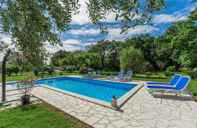 Apartment with pool, garden, air conditioning, barbecue, children's playground