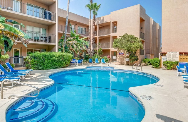 Beach-Adjacent Condo with Pool - Easy Access to Shops & Resturants