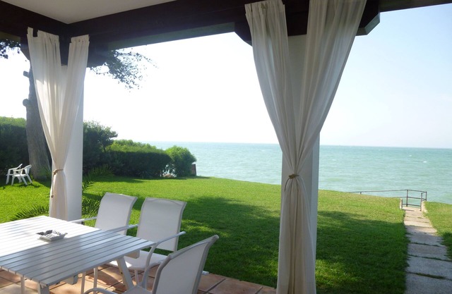 Beach line villa with stunning sea views. WIFI. Private garden