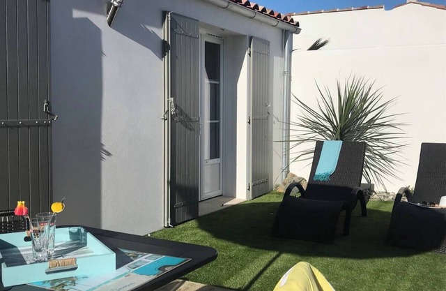 Beach & port, on foot from our charming new villa