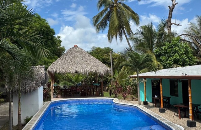 Beachfront Escape in Esterillos Centro - Pool, A/C, WiFi & Private Rooms