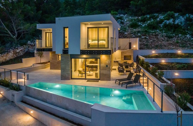 Beachfront Villa Aurelia with heated Pool, Sauna & Fitness