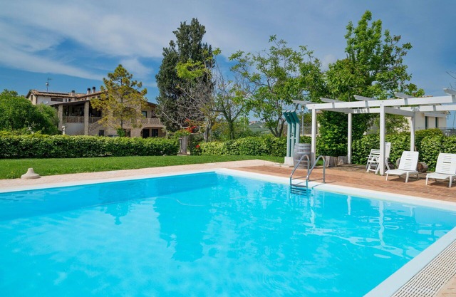 Beautiful apartment for 4 people with A/C, WIFI, pool, TV, patio and pets allowed