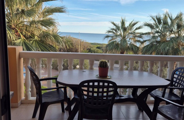 Beautiful apartment Lilou in 1st line sea view, swimming pool and palm trees