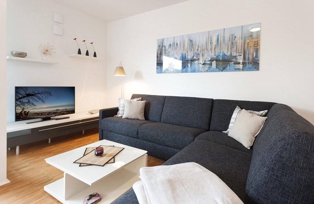 Beautiful apartment with sunny balcony and underfloor heating - only 150 m to the beach