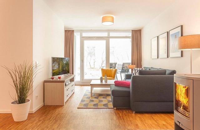 Beautiful apartment with south-facing terrace, wood-burning stove & underfloor heating - 150m to the beach