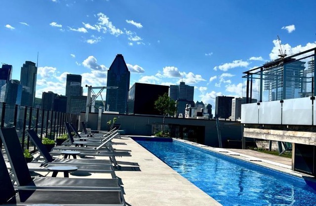 Beautiful condo with a pool at rooftop