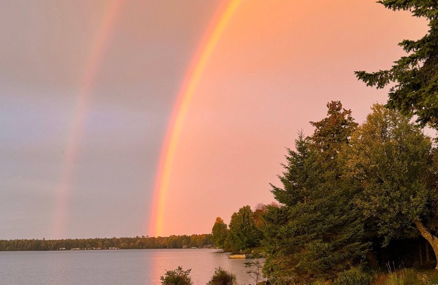 Beautiful Huron Bay sunsets from your own private beach.
