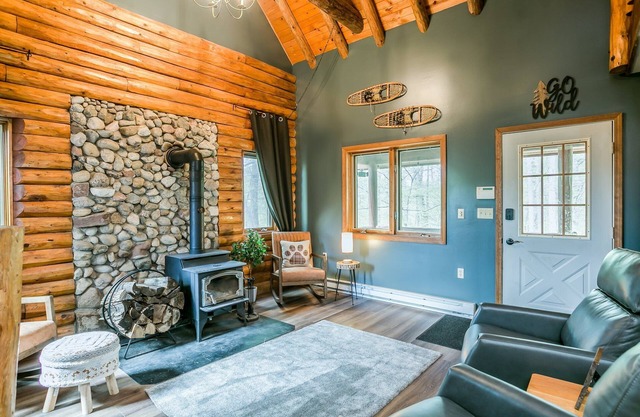 Beautiful Log Cabin Tucked Away on 5 Acres