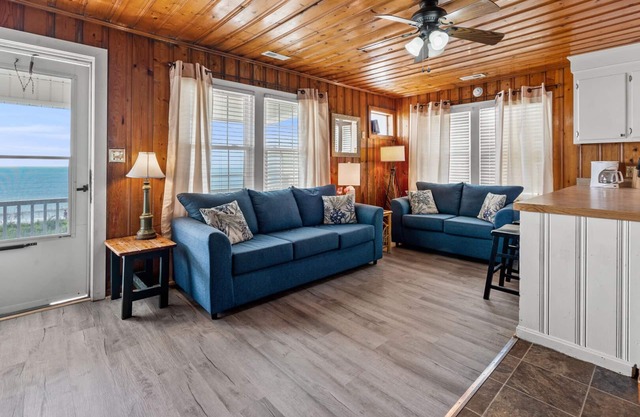 Beautiful oceanfront balcony at this pet-friendly, cozy apartment steps from the sand