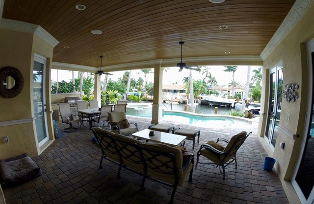 Beautiful Two-Story Waterfront Home 4 BR And 3 1/2 Bath with pool and hot tub. .