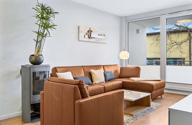 Beautiful vacation apartment with balcony, underfloor heating & only 150 m to the Baltic Sea beach