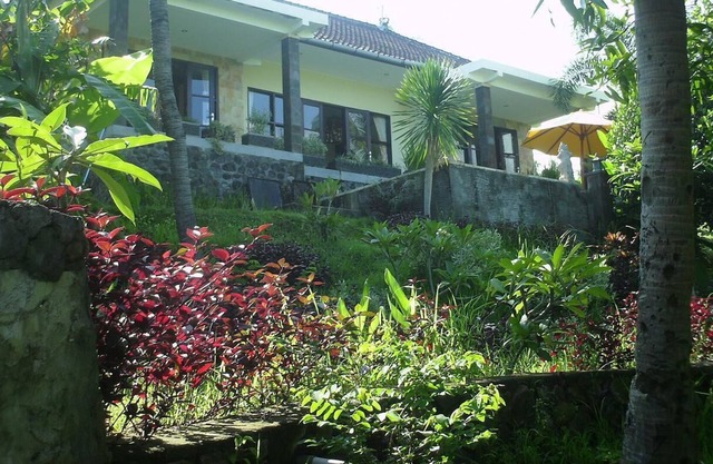 Beautiful villa on a hill with sea, mountain and rice field views