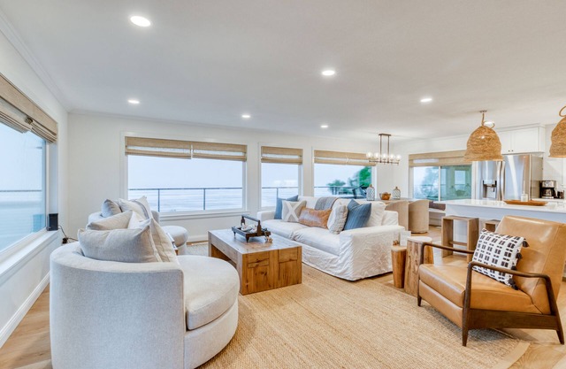 Beautiful waterfront home with private hot tub, large deck, grill, & beach views