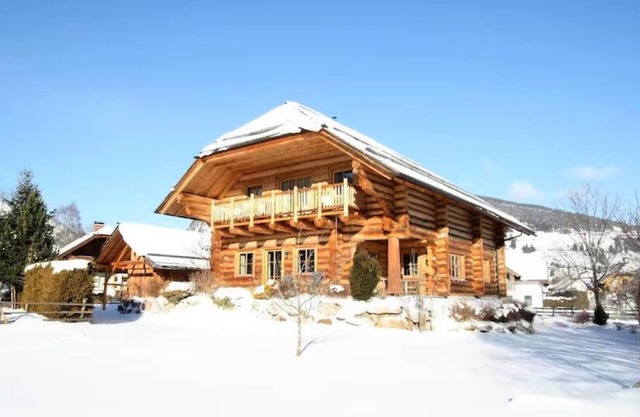 Beautiful wooden log house with sauna and garden