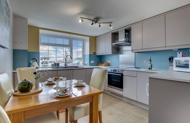 Beautifully decorated, homely yet spacious apartment looking out onto the harbour of the much loved