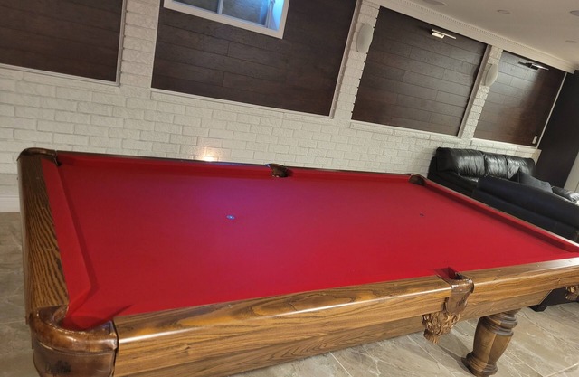 Beautifully Finished Apartment with Heated Floors and Pool Table