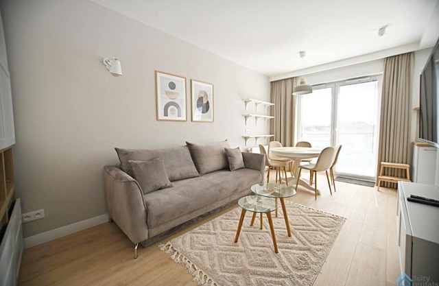 Beige 3city Apartment with Parking in Gdańsk by Noclegi Renters