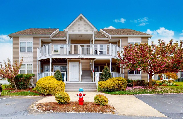 Bethany Bay Condo Overlooking Water with Shared Pool, Private W/D, & WiFi