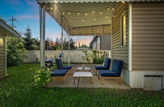 Big, fun-filled stay steps from Whyte Ave with yard, games, and coffee bar