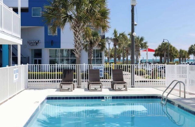 Boutique on the beach, Studio #118 + Pool