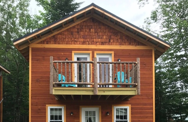 Brand New Beach Front Cottage, located on 4th Lake, walking distance to town.