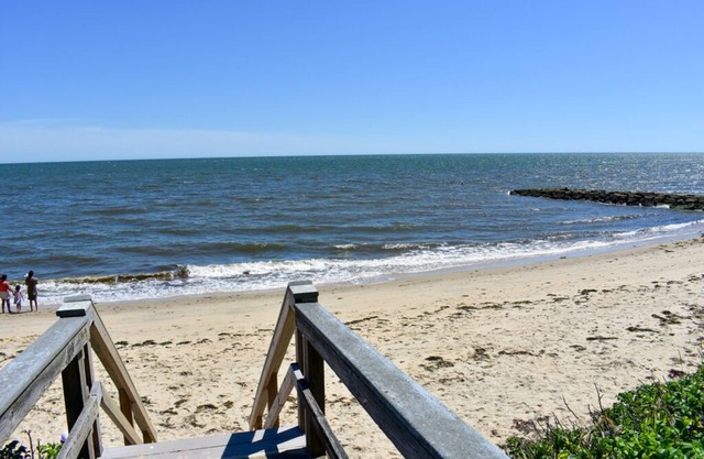 Brand new Ocean View Condo with private balcony, steps from the beach!