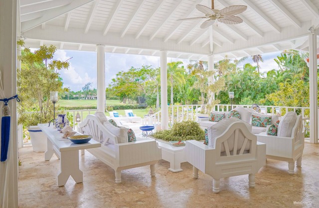 Breathtaking Villa Overlooking Golf Course Within Walking Distance to Beach