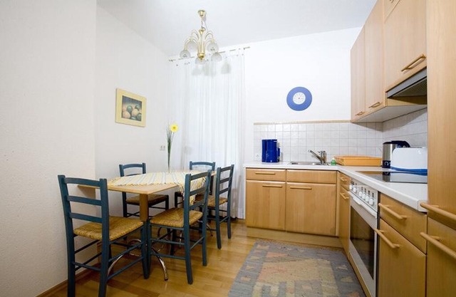 Bright Holiday Apartment “Ferienwohnung Bregenz 8 Top 1” in Central Location Close to Lake Constance with Wi-Fi, Terrace & Garden