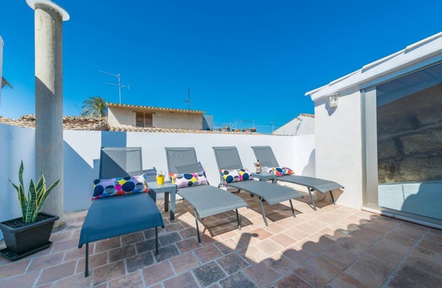 CA NA SERRIETA - Cosy townhouse with great chill-out terrace. Free WiFi