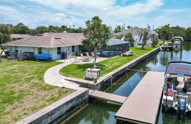 Canal-front 4BR/2BA home with pool and brand-new dock—room for 2 boats! Recently remodeled, 2-car garage, and minutes to the Gulf. Perfect Crystal River getaway! Boat and trailer parking on property; ramp nearby.
