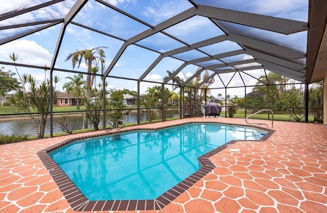 CAPE CORAL FLORIDA WATERFRONT WITH HEATED POOL, PRIVATE DOCK