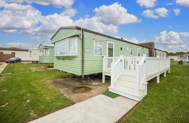 Caravan with decking at Highfield Grange Holiday Park in Essex ref 26260E