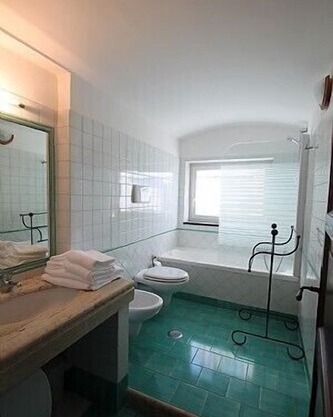Casa Nocciola A, fully refundable with voucher*: A graceful two-story apartment surrounded by the greenery.