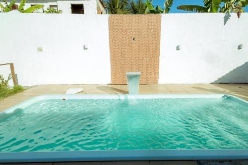 Casa pet-friendly com piscina de frente para o mar
