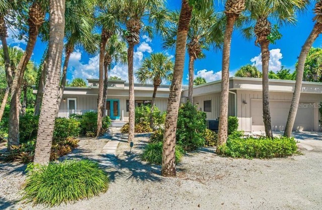 Casey Key Oasis 3BR home on .75 acre w heated pool, boat dock, beach access