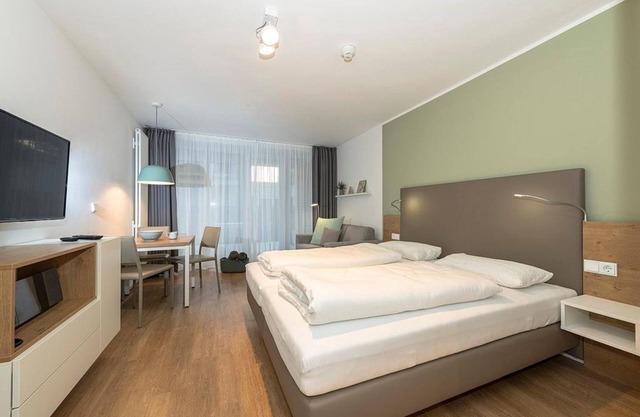 Central apartment with sunny terrace, sauna in the house - only 300 m to the beach!