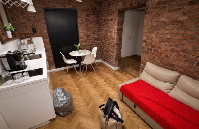 Central Krakow Comfort: Loft with Queen Bed, Steps to Attractions