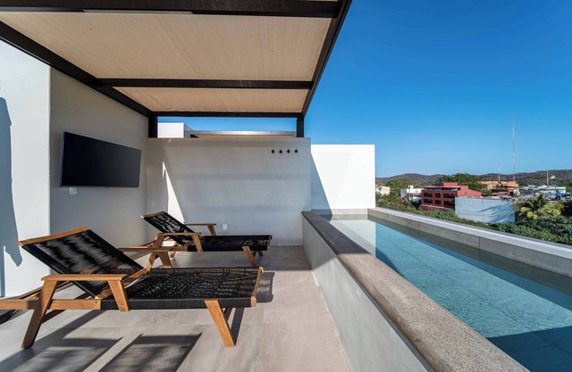 Centrally located with private rooftop terrace and private plunge pool!