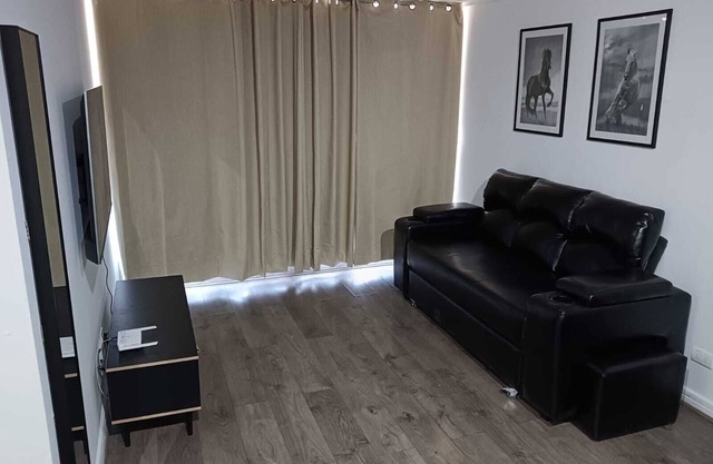 Charming 2-bedroom apartment with WiFi and fitness room in vibrant Santiago