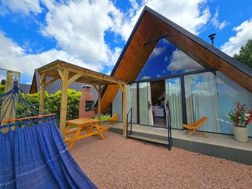 Chalé com banheira de hidromassagem e lareira l Chalé Azul