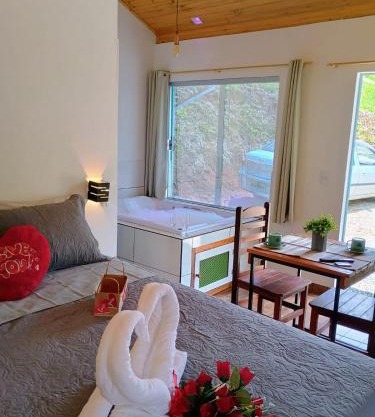 Chalé Som do Riacho e Chalé Riacho Sereno, com Hidromassagem e Lareira á 20 minutos de Gonçalves-MG