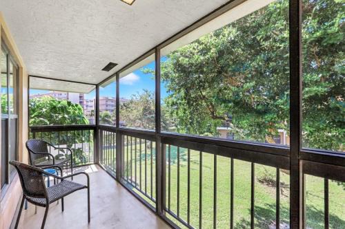 Charming condo with two pools and steps to beach
