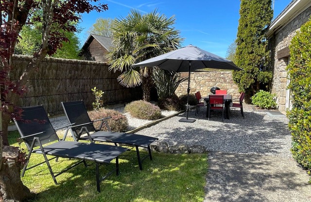 Charming Cottage with Fireplace, Mezzanine, and Garden near Guérande