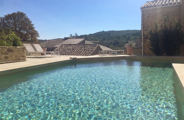 Charming house in a village 15 km from Uzès, heated pool, dominant view