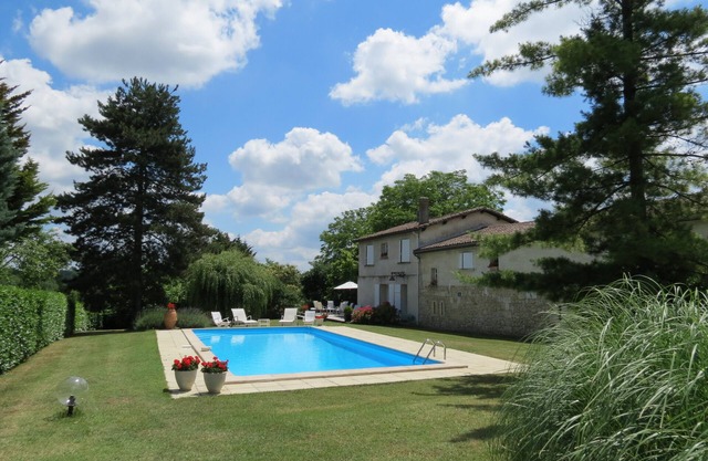 Charming stone house in a park with trees on the hillsides of Bordeaux