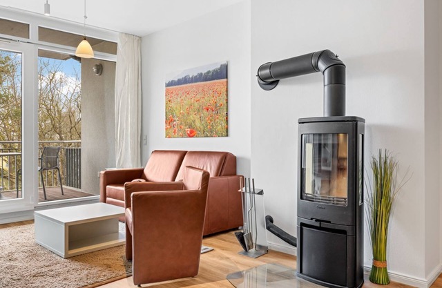Chic Baltic Sea apartment close to the beach with balcony, wood-burning stove and underfloor heating